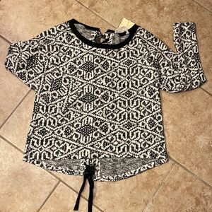 Black and white faux leather lace back top